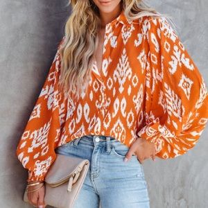 Orange balloon sleeve, button up blouse